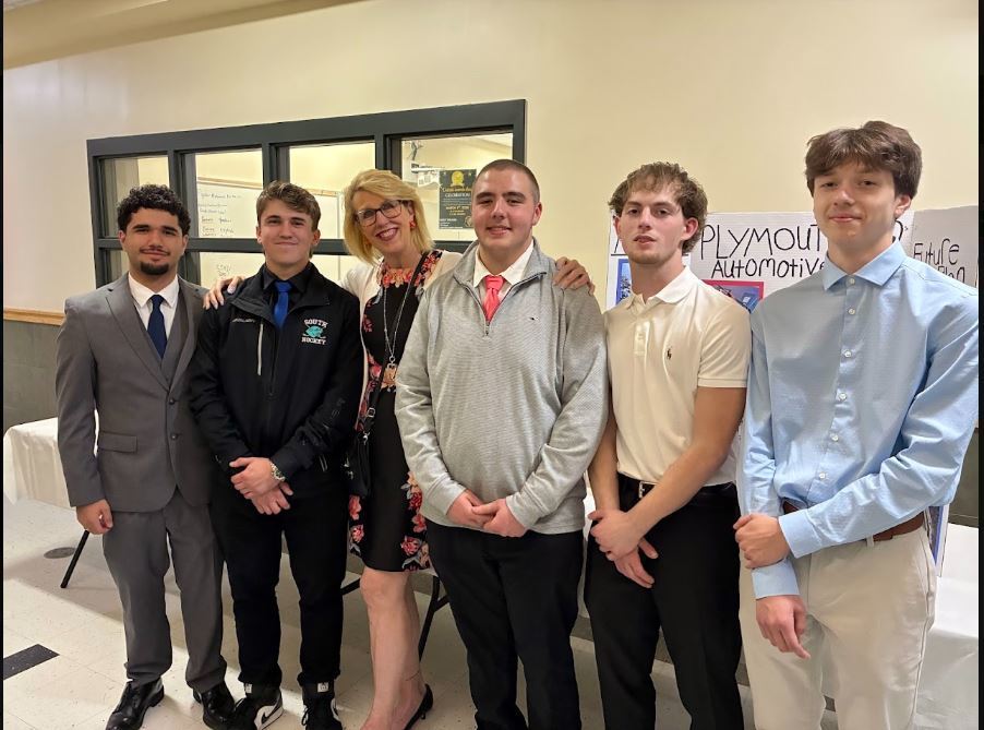 photo of automotive students and faculty
