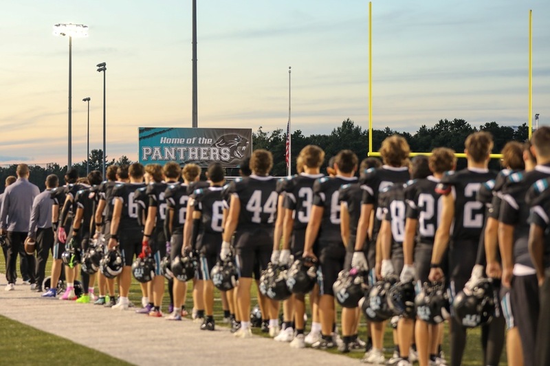 The community gathers to honor Karl Braun and support the Plymouth South Panthers football team.