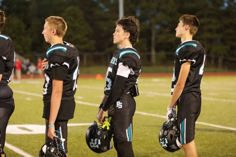 The community gathers to honor Karl Braun and support the Plymouth South Panthers football team.