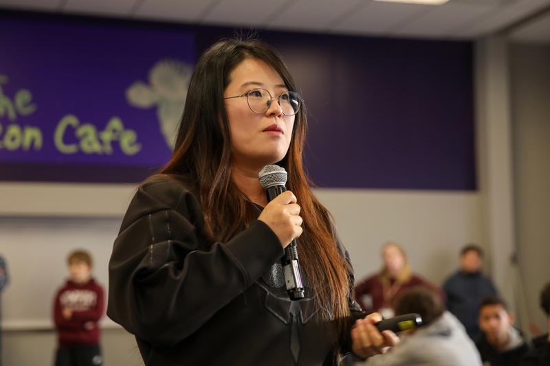 Grace Jo speaks to seventh graders at PCIS.