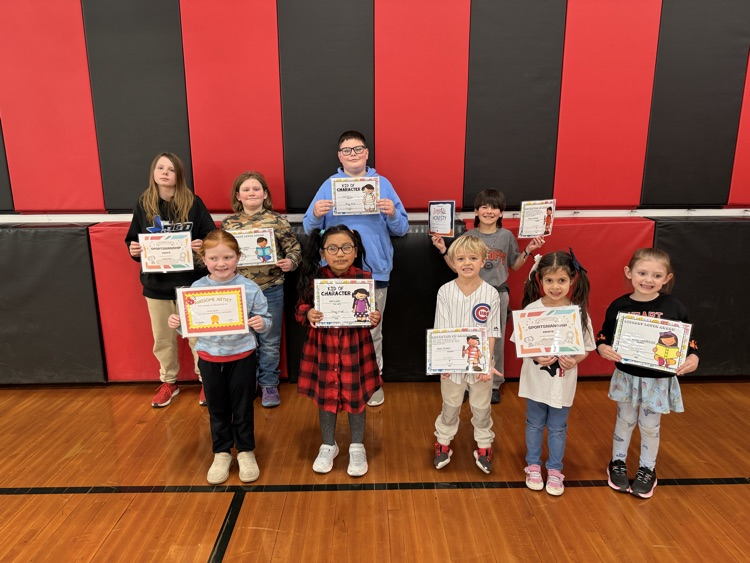 specials award winners hold their awards