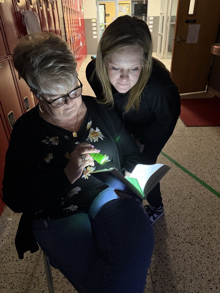 5th grade teachers enjoying a good book
