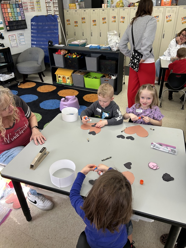 kindergarten students explore stations