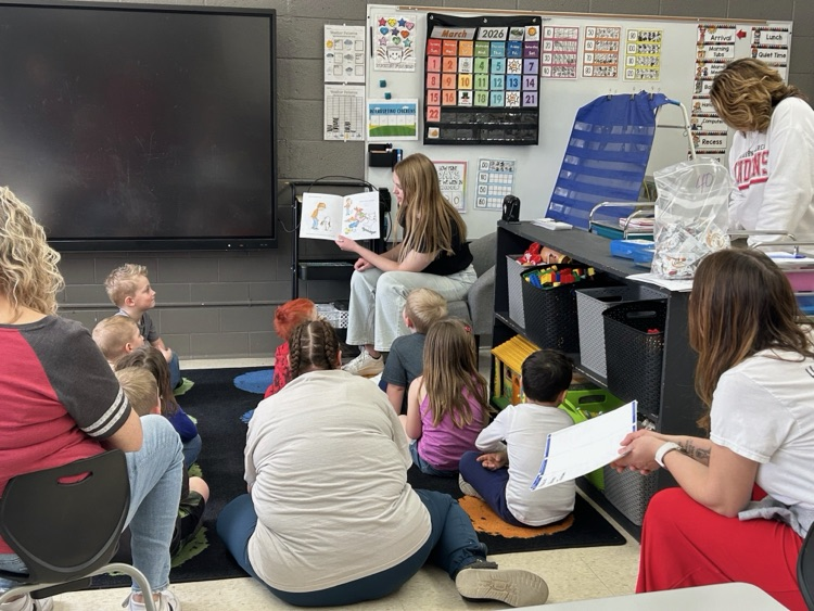 kindergarten students explore stations