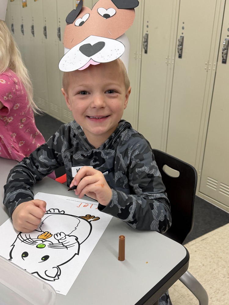 kindergarten students explore stations