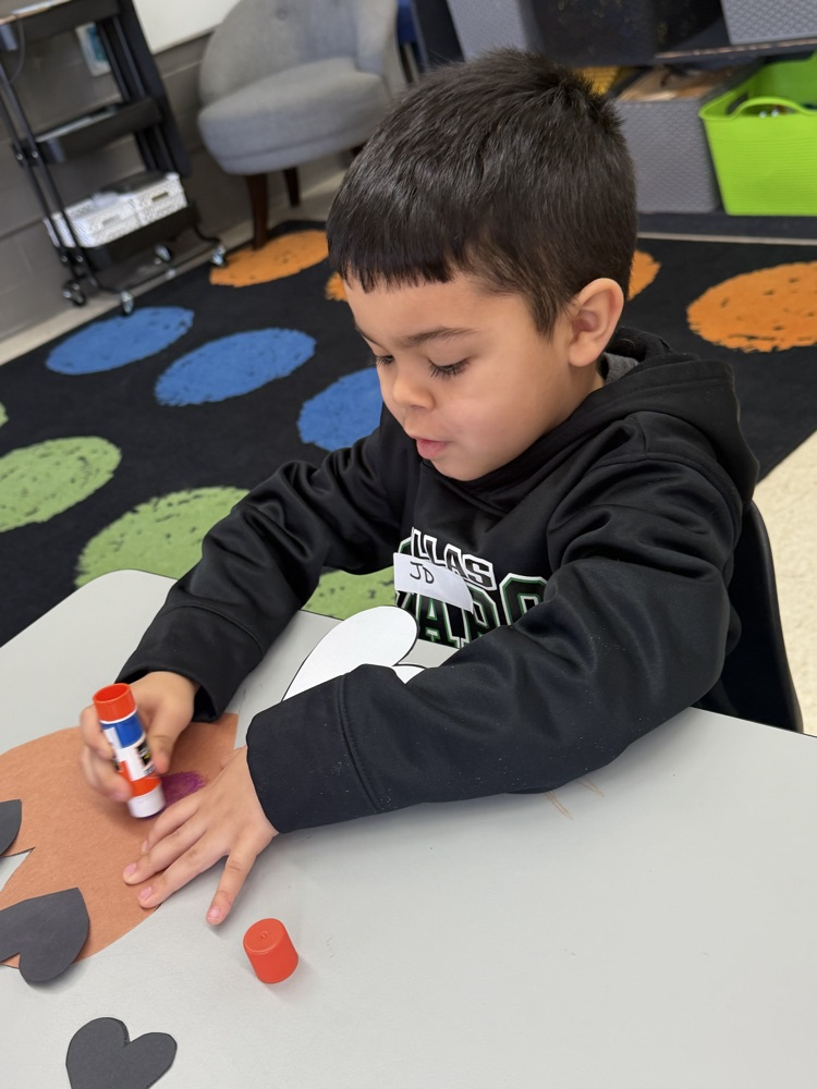 kindergarten students explore stations