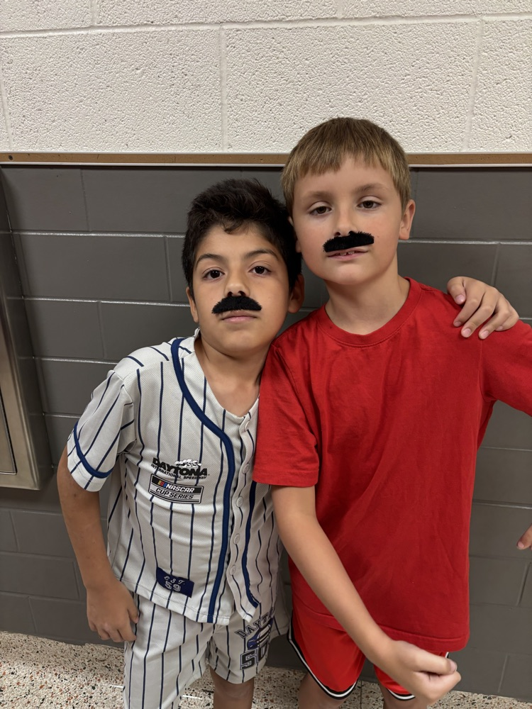 students posing for dress up day 