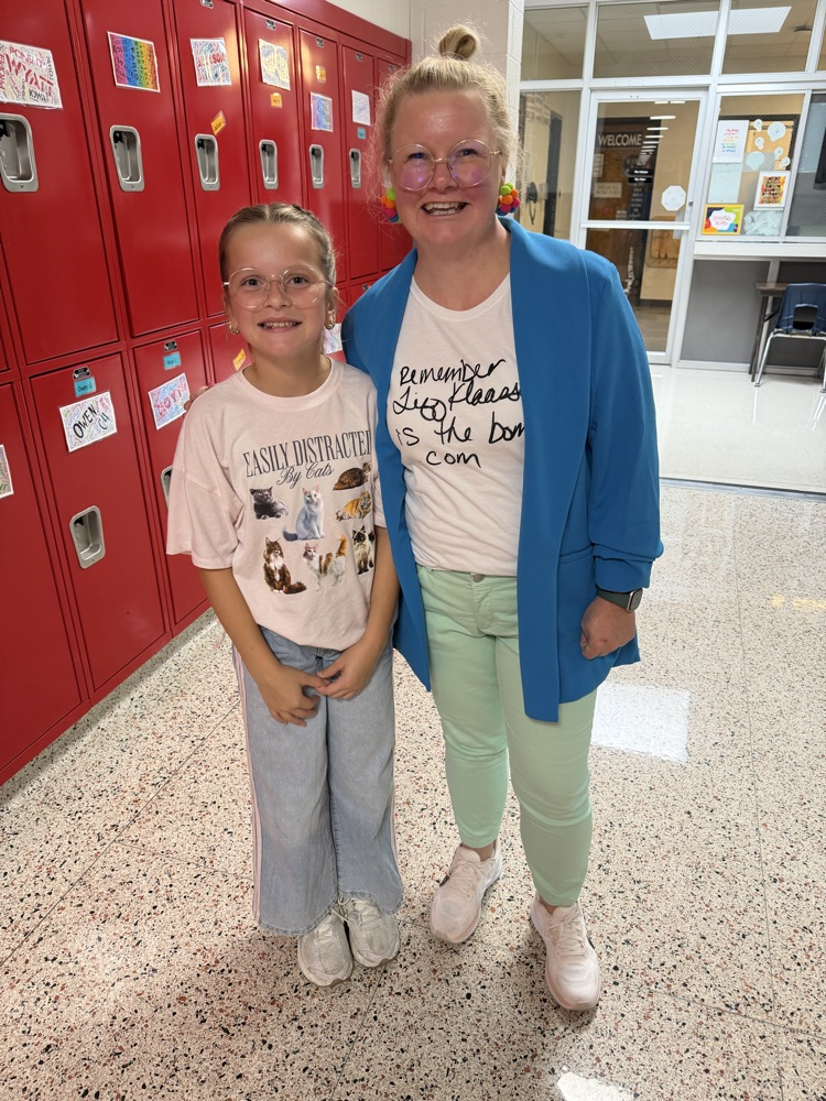 student and teacher posing for dress up day 