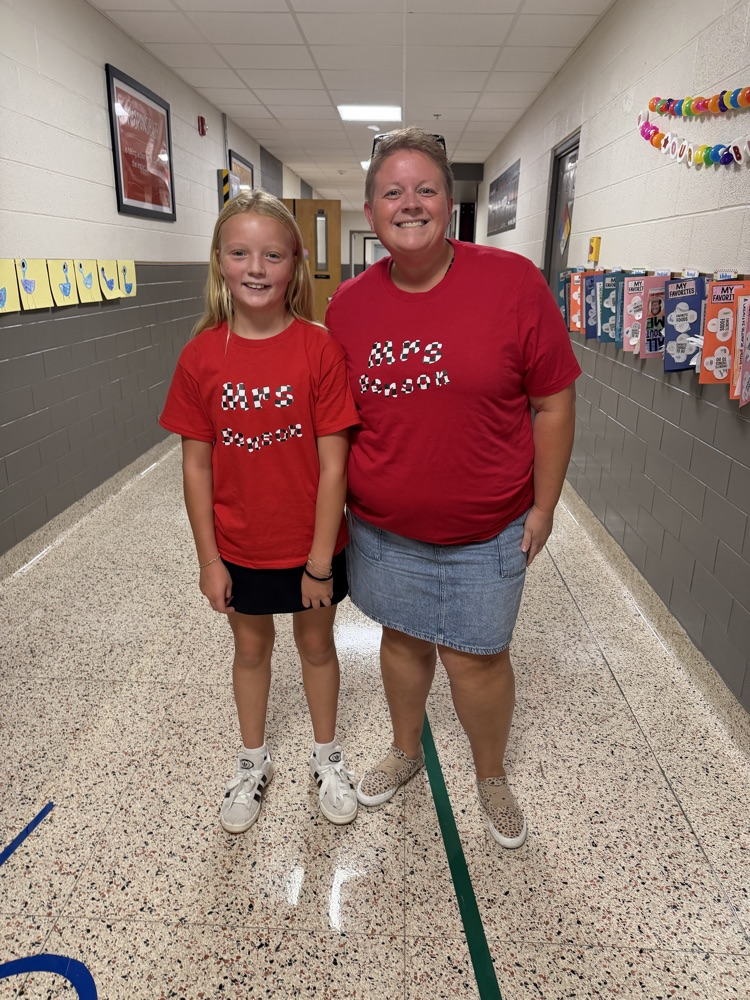student and teacher posing for dress up day 