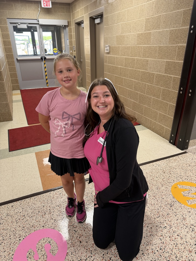 student and teacher posing for dress up day 