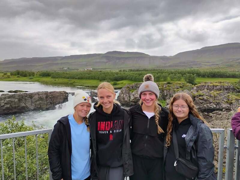 Group of Student waterfall behind