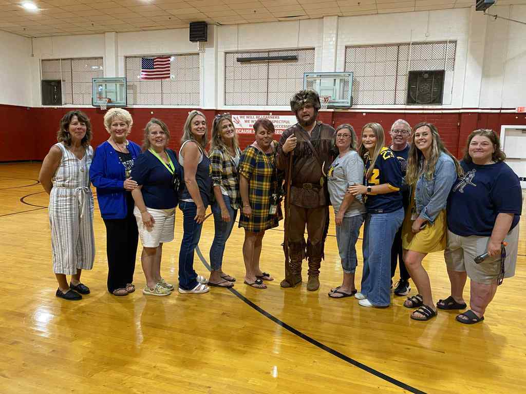 HES staff with mountaineer