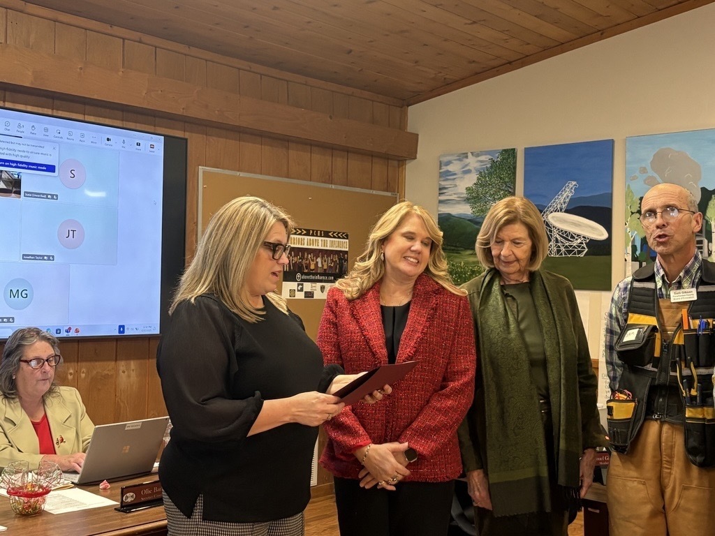 Dr. Leatha Williams, Superintendent presenting HES Principal, Becky Spencer with a certificate.