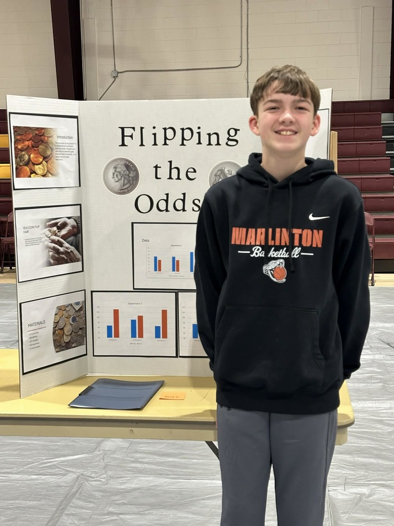 students presenting at science fair