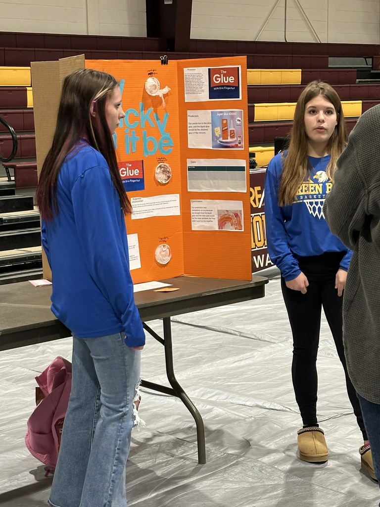 students presenting at science fair