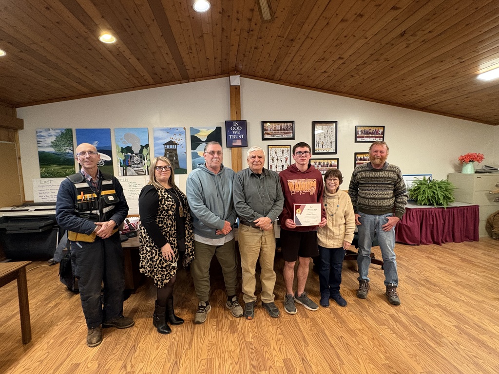 BOE members with student athlete