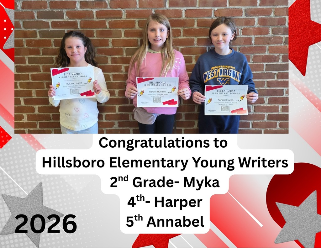 Three children stand in front of a brick wall holding Young Writers certificates. Below the photo, a decorated background features text congratulating Hillsboro Elementary’s 2026 Young Writers winners: Myka (2nd grade), Harper (4th grade), and Annabel (5th grade).