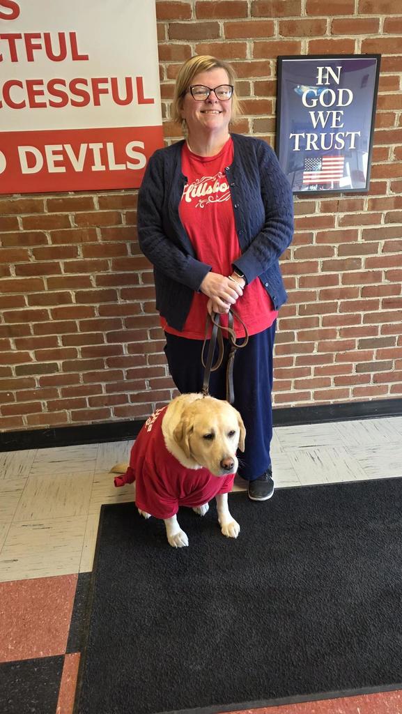 Ms. Marsha Grimes and Kasha the therapy dog