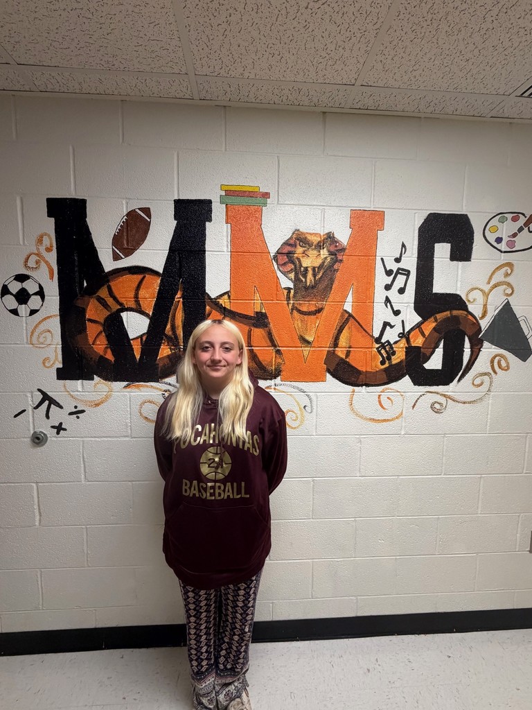 MMS student smiling for a photo after earning selection to a competitive STEM program at the United States Naval Academy.