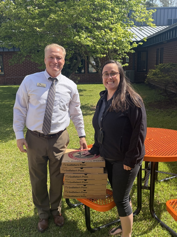 city national bank Brett withers and Nebraska Scotchie with staff pizza 