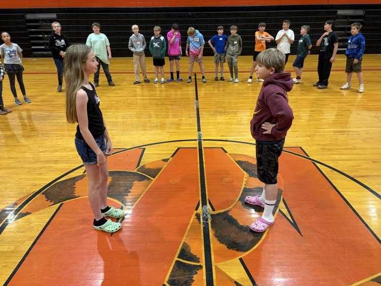 kids playing an activity with ms hill