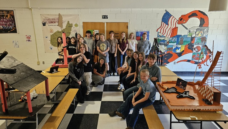 8th grade group after presenting their roller coasters 
