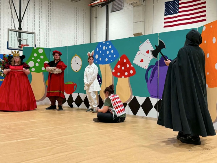 images of students performing Alice in Wonderland