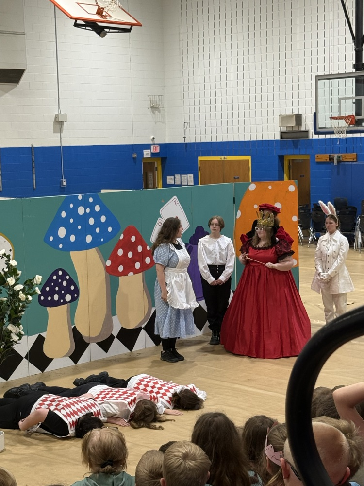 images of students performing Alice in Wonderland
