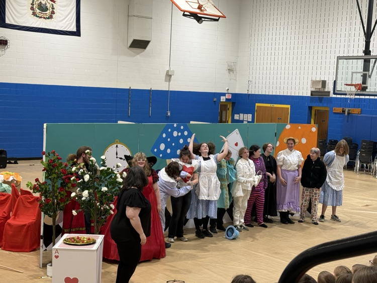 images of students performing Alice in Wonderland