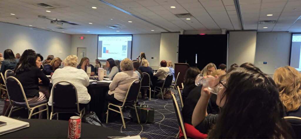 conference attendees at table