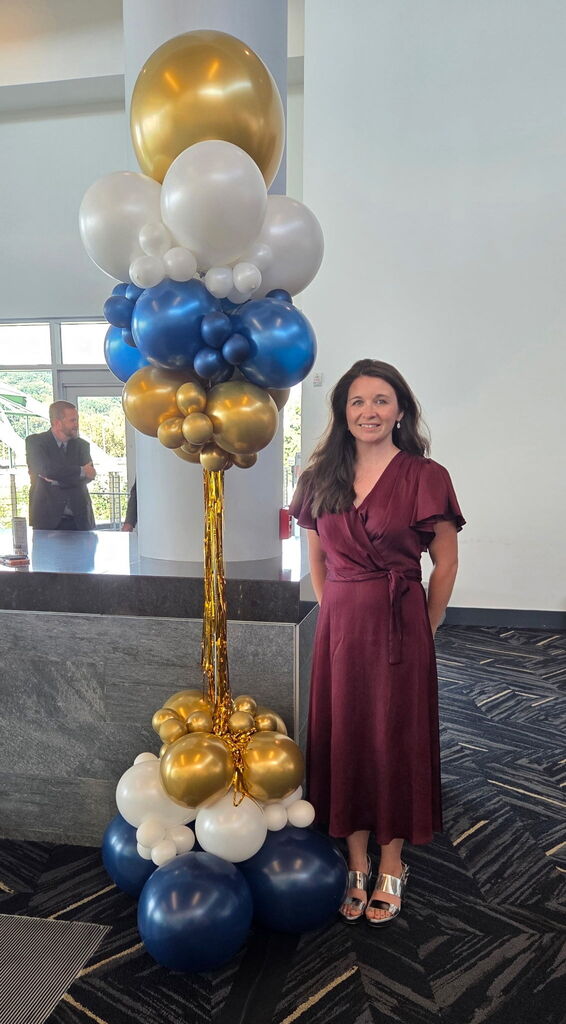 Samantha Feather posed at recognition event