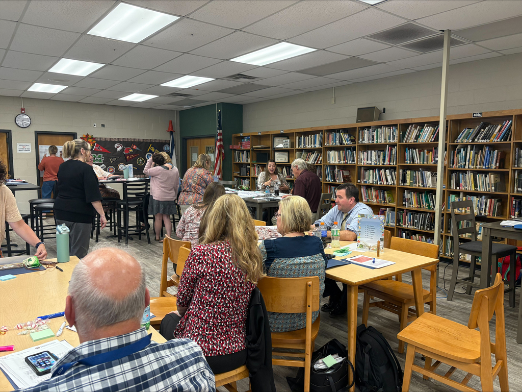 participants engage in discussion at stakeholders meeting.