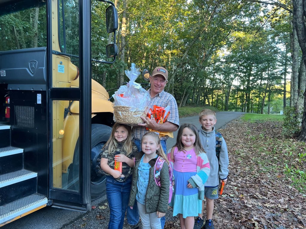 Gary receiving gifts from his students