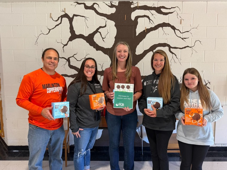 dolly bars provided to mms staff and Pendleton community bank. picture with 3 staff members from mms, one student from mms and one employee from pcb