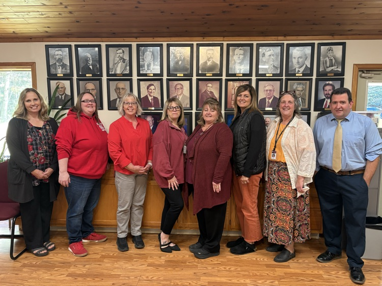 central office staff dressed in school colors
