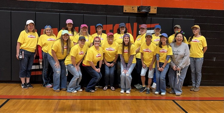mms staff dresses up in yellow play doh costumes for Halloween