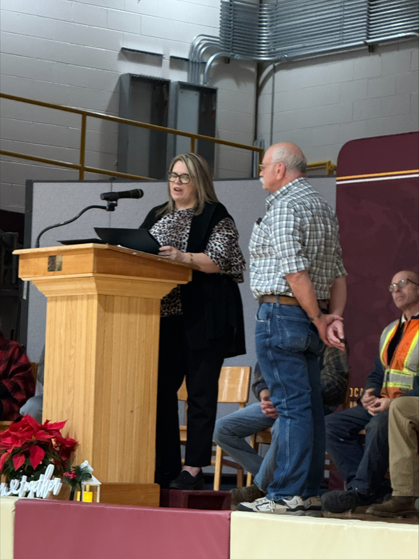 Dr. Williams presents award to Duane Gibson