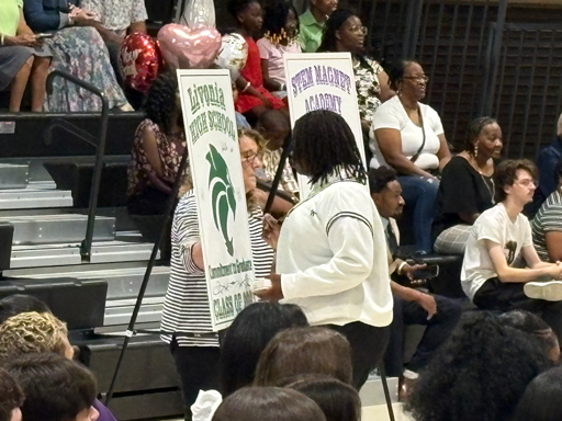 Student signing at ring ceremony