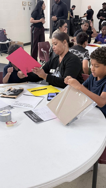assistant principal Jones at the table helping a student