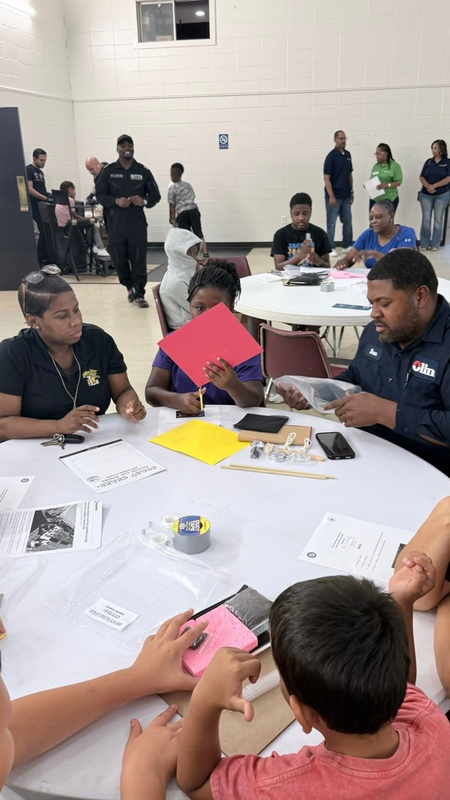 Family at a table with the students