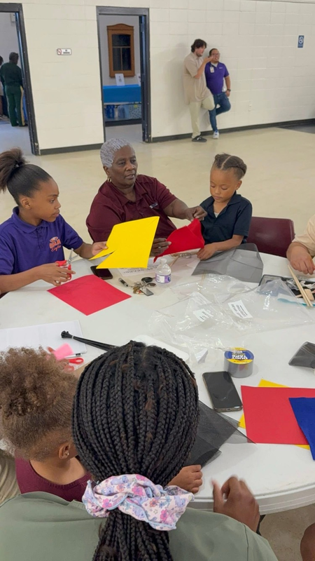 Family table working with their children