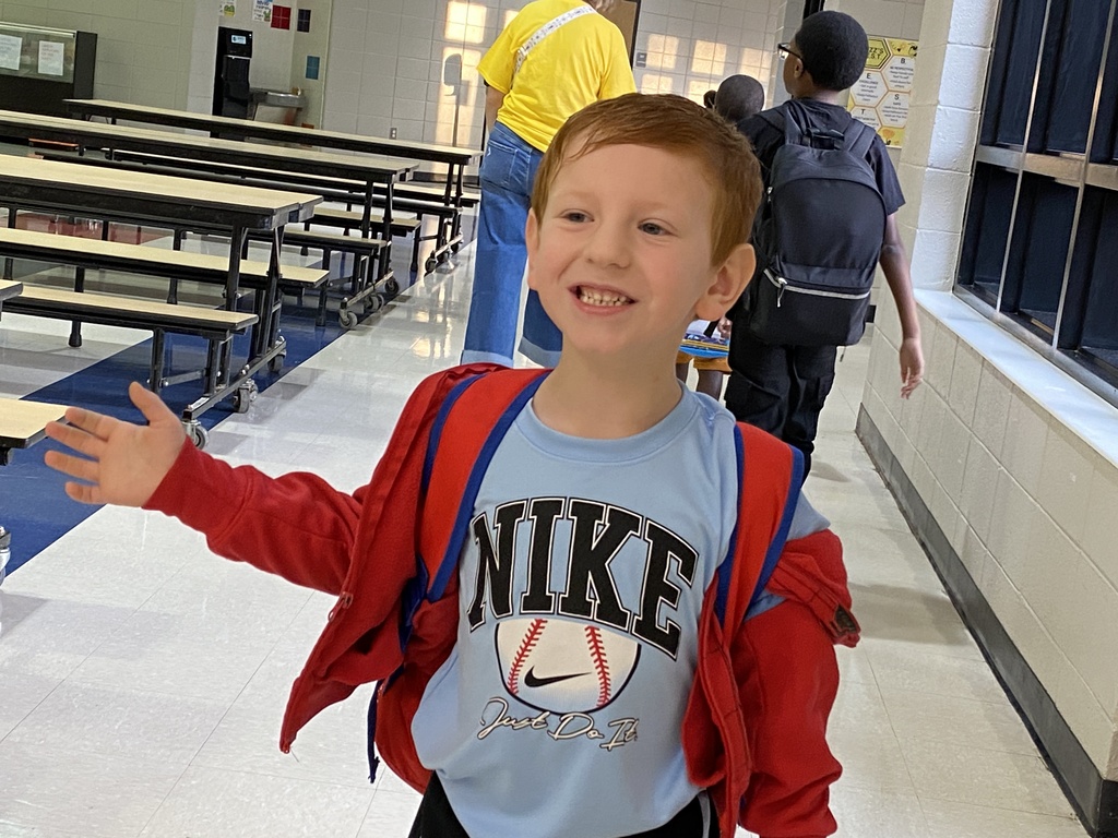 a student walking down the hallway
