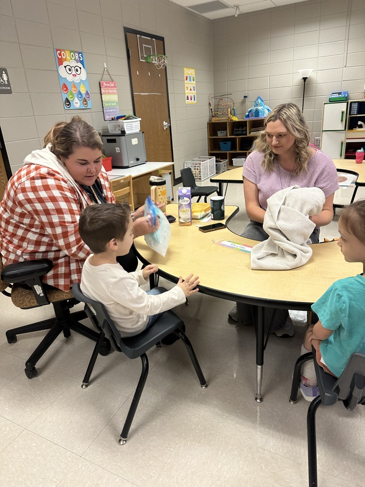 Mr. Hall’s class at music and more and Ms. Wallace’s class making ice cream in a bag.