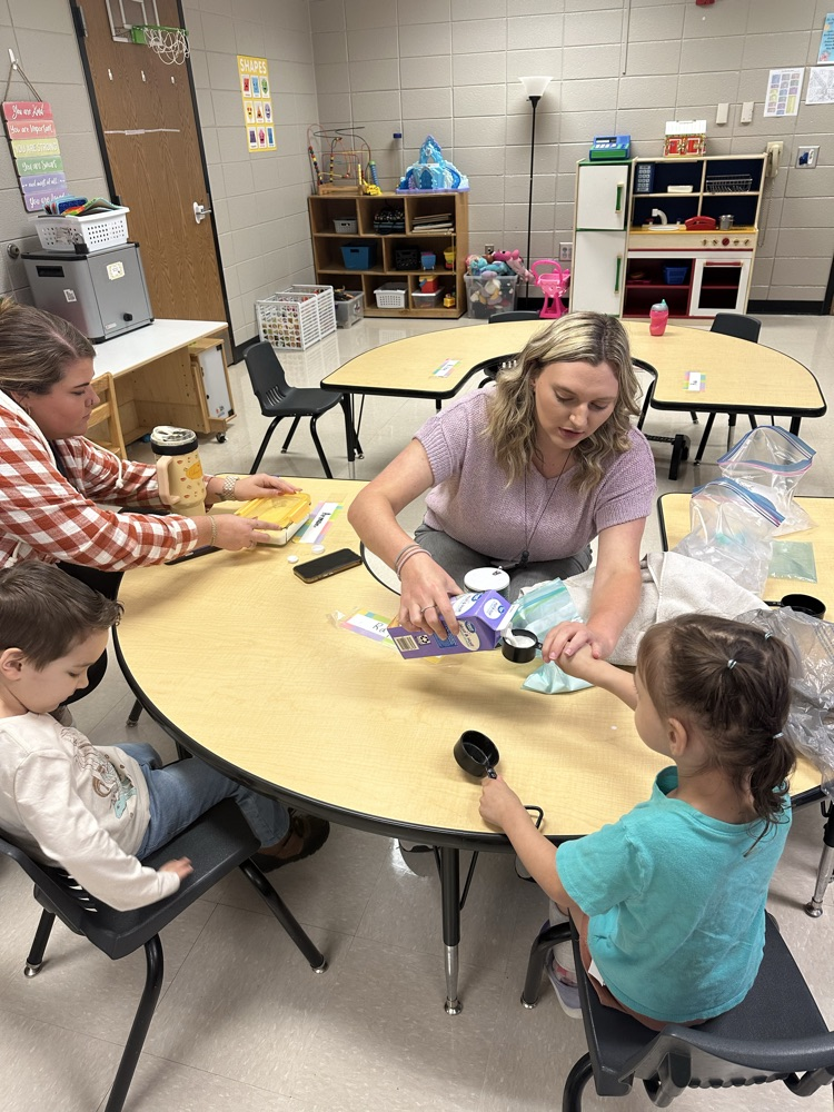 Mr. Hall’s class at music and more and Ms. Wallace’s class making ice cream in a bag.
