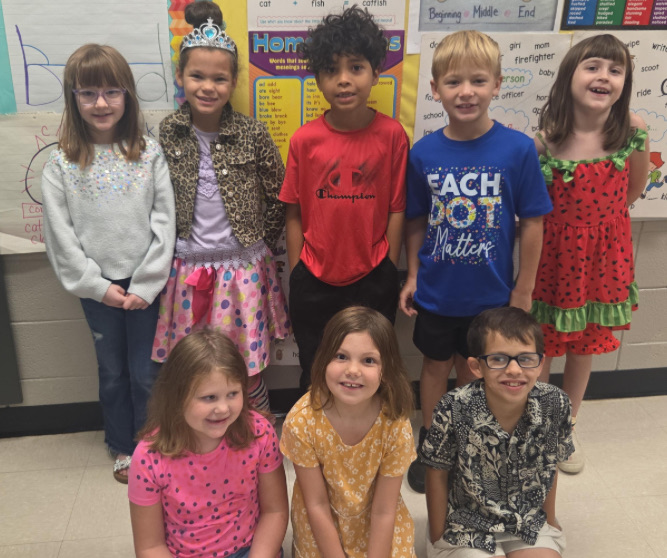kids wearing dots for dot day