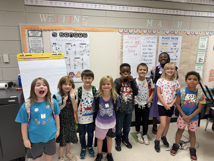 kids wearing dots for dot day