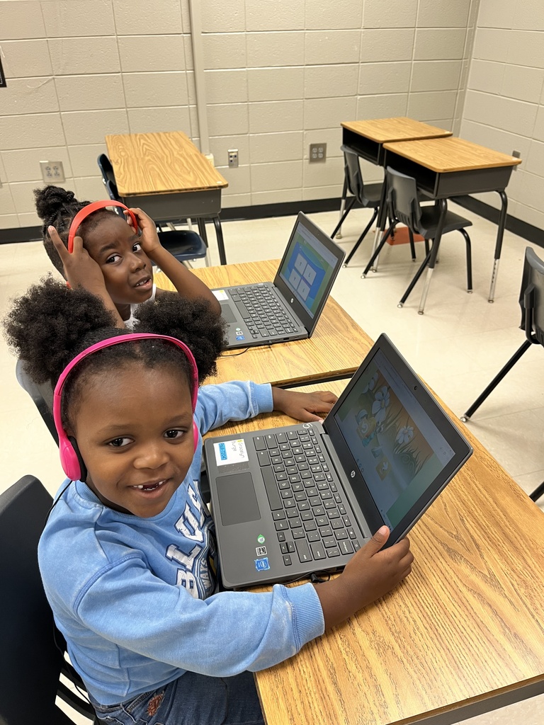 Students working on computers in computer lab. 