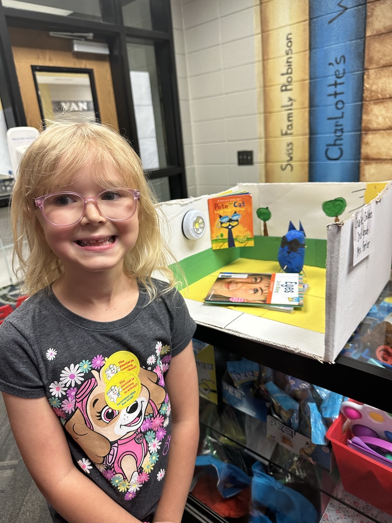 Charlie posing with her potato book character.