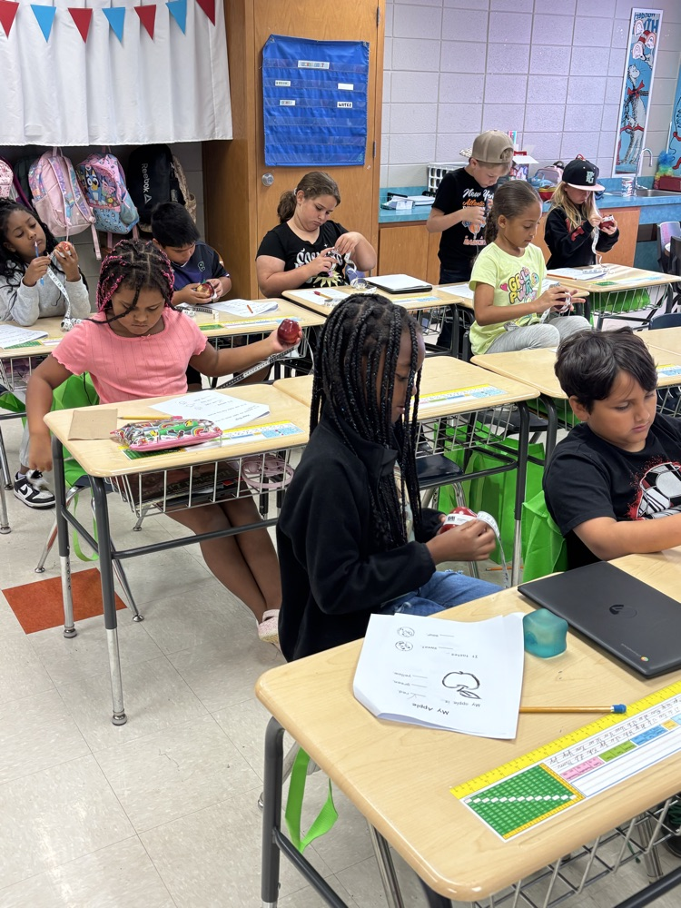 pictures of students completing Johnny Appleseed