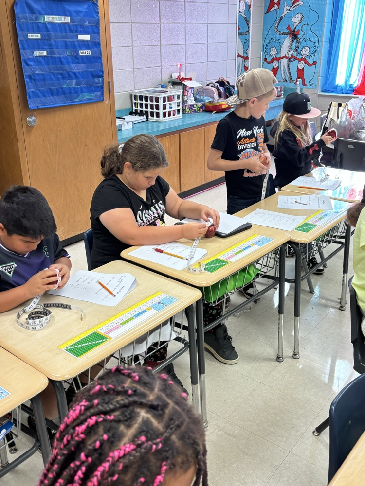 pictures of students completing Johnny Appleseed